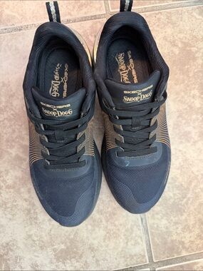 Skechers Men’s Black Sneakers with Gold Accents